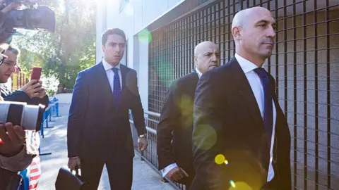 Getty Images Luis Rubiales walking outside a Madrid court in April