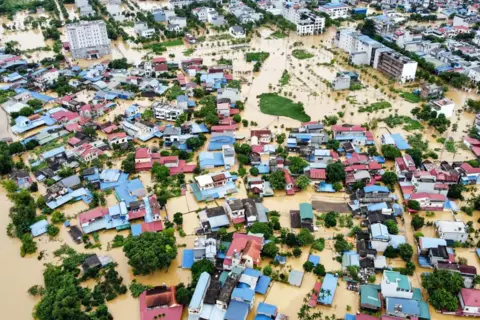 Getty Images Aerial picture showing flooded streets and buildings in Thai Nguyen province