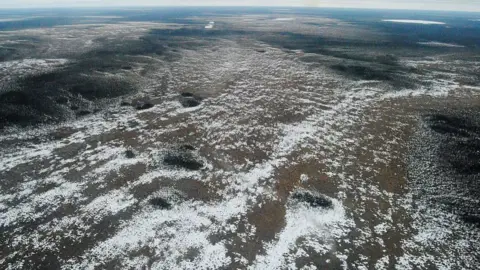 Getty Images An areal view of snow-capped carid lands