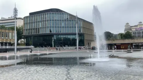 The view of the new £35 million One City Park office block from the fountains in City Park