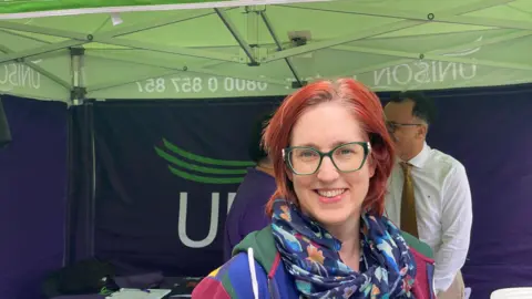 Alice Whaley/BBC Anita Abraham at the rally