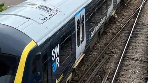 A close-up image of train on tracks
