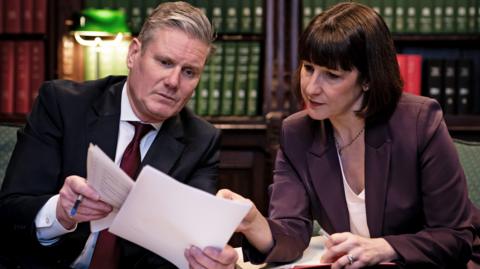 Labour Sir Keir Starmer and Rachel Reeves ahead of the previous government's Budget in 2024