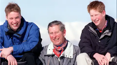 Ken Goff/Getty Images England's Prince Charles poses with sons Prince William and Prince Harry on Madrisa during vacation. (Photo by Ken Goff/Getty Images)