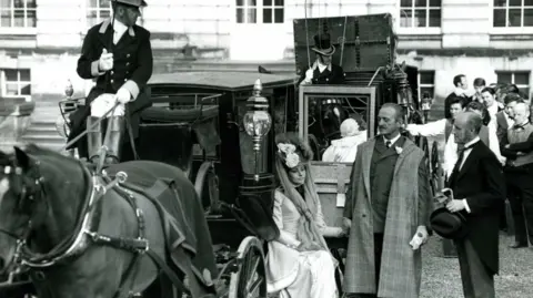 Keith Massey/Yorkshire Evening Press David Niven and Sophia Loren on set in Lady L. Loren is sat on a carriage being towed by horses.