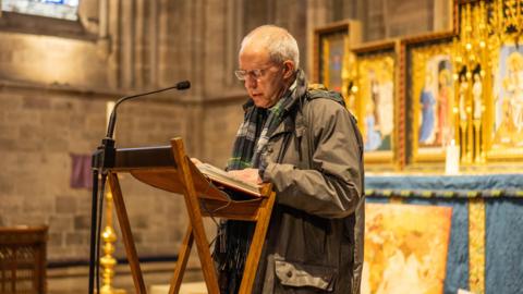 The Archbishop of Canterbury leading prayers for peace at Hereford Cathedral