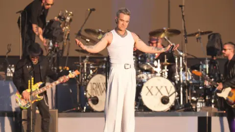 PA Media Robbie Williams on stage in 2024 at BST Hyde Park in London