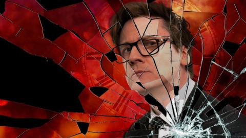 A picture of Ed Byrne but made up of fragments of shattered glass 