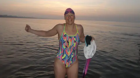 Woman in swimming costume