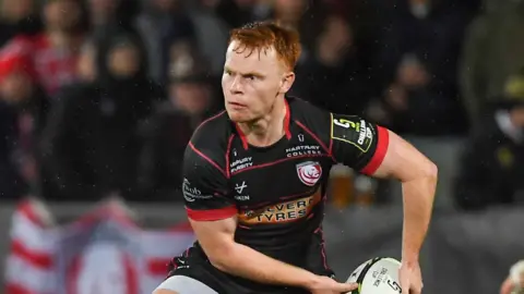 Caolan Englefield throws the ball during a match