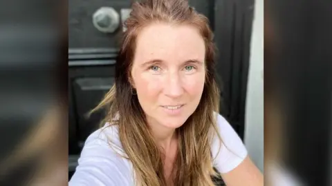 Jane Creswell Jane Creswell is smiling at the camera, has ginger hair, blue eyes and is wearing a white t-shirt.