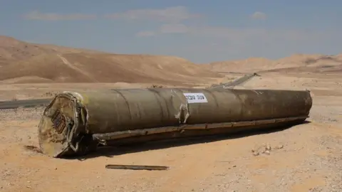 EPA The wreckage of an Iranian ballistic missile outside the city of Arad in southern Israel, October 2, 2024