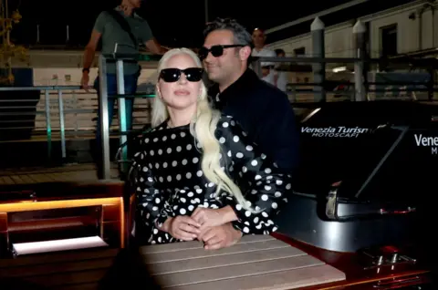 Getty Images Lady Gaga dan Michael Polansky tiba di Venice Film Festival pada bulan September, 2024