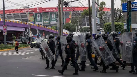 Mexico City police stood guard around the Azteca stadium in the days leading up to the opening match