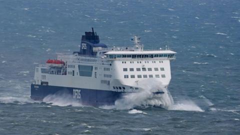 A DFDS ferry sails through choppy waters