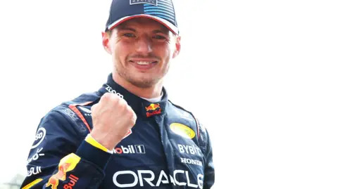 Max Verstappen clenches his fist to celebrate winning the Emilia Romagna Grand Prix