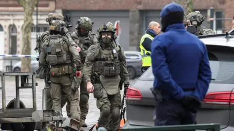 Reuters Police members work at the Clemenceau metro station, after a shooting took place in Brussels, Belgium February 5, 2025.