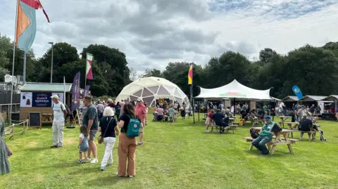 BBC People milling about on the maes in Pontypridd