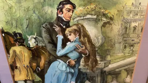 Nicola Haseler Artwork on display at Hertford museum, it is Francis Marshall's front cover of one of Barbara's novels. It shows a woman with a very long golden ponytail and blue victorian dress swooning in the arms of a dark haired handsome man wearing a cravat and grey coat. Behind them are two horses and a balustrade.