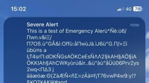 A screen shot of a garbled emergency message