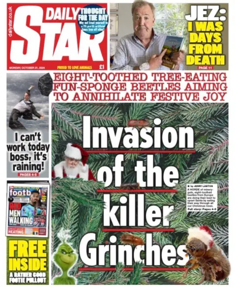 The front page of the Daily Star reads "Eight-toothed tree-eating fun-sponge beetles aiming to annihilate festive joy: Invasion of the Killer Grinches"