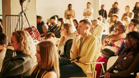 Crowds of young people sat down during the event 