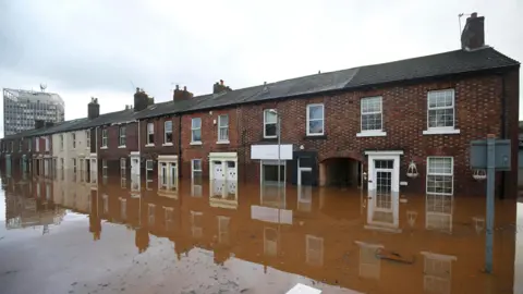 Reuters Street submerged under flood waters in Carlisle after Storm Desmond in 2015