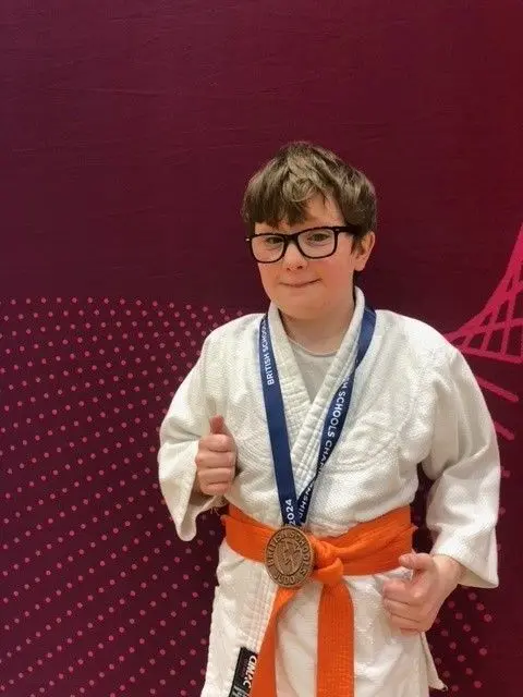 Kathleen Fiddes Daniel with is medal