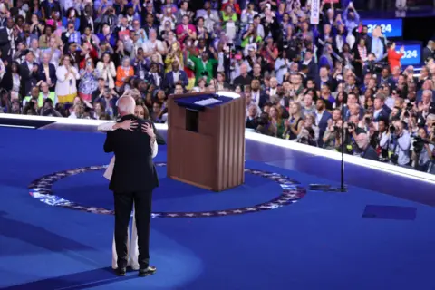 Reuters U.S. President Joe Biden embraces his daughter Ashley Biden on stage during Day one of the Democratic National Convention (DNC) in Chicago