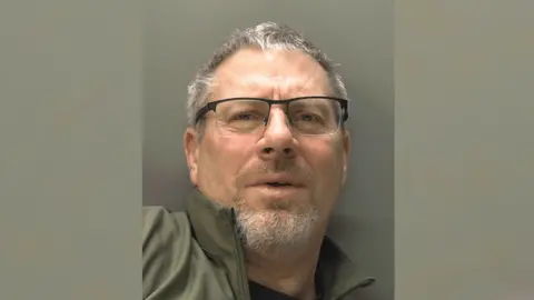 National Crime Agency A police photo of Karl Richter