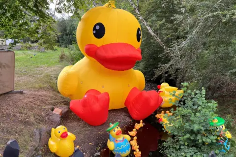 A giant yellow inflatable duck at the Belladrum festival site.