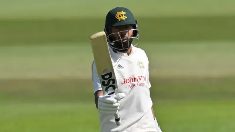Haseeb Hameed raises his bat