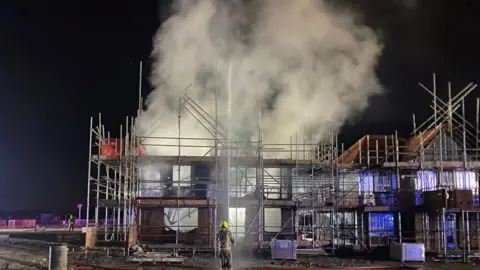Fire tackled in unfinished house at building site