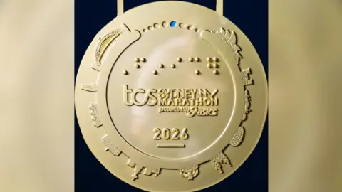 A photo showing the Sydney Marathon medal, as shared by organisers on social media.