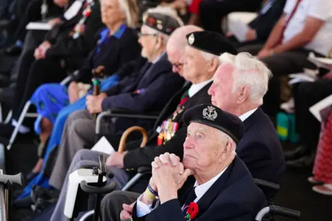 Jane Barlow/PA Veterans looks on during the UK national commemorative event for the 80th anniversary of D-Day, held at the British Normandy Memorial in Ver-sur-Mer, Normandy, France. Picture date: Thursday June 6, 2024