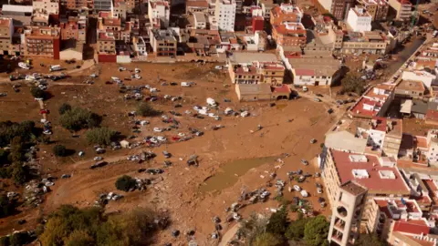 Reuters An aerial view of the destruction and flooding near Valencia on 31 October