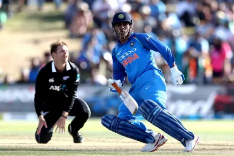 AFP MS Dhoni of India runs between the wickets during game two of the One Day International Series between New Zealand and India at Bay Oval on January 26, 2019 in Mount Maunganui, New Zealand. 