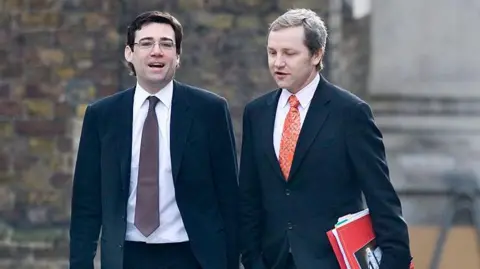 Getty Images Andy Burnham and James Purnell walking down Downing Street