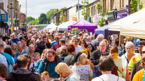 Brighouse BID A busy street market event in Brighouse