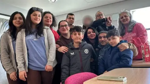 A family group on a ferry