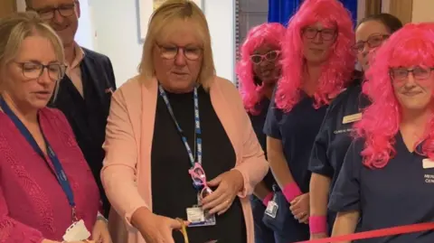 Royal Cornwall Hospitals NHS Trust Kim O'Keefe cutting the ribbon on the upgrade