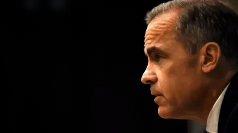 A close-up shot of Mark Carney's face from the side, with a black background.