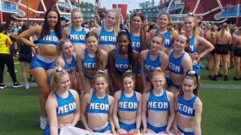 SA Academy Neon cheerleading team