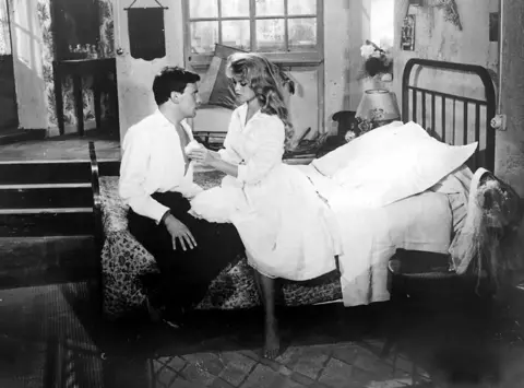 ZUMA PRESS/Alamy Jean Louis Trintignant and Brigitte Bardot in a scene from And God Created Woman