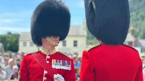Two of the guards face to face.