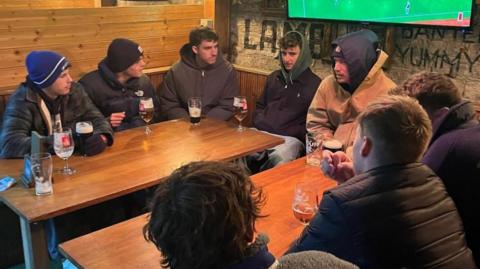 Image of a group attending a Grieving Pint session