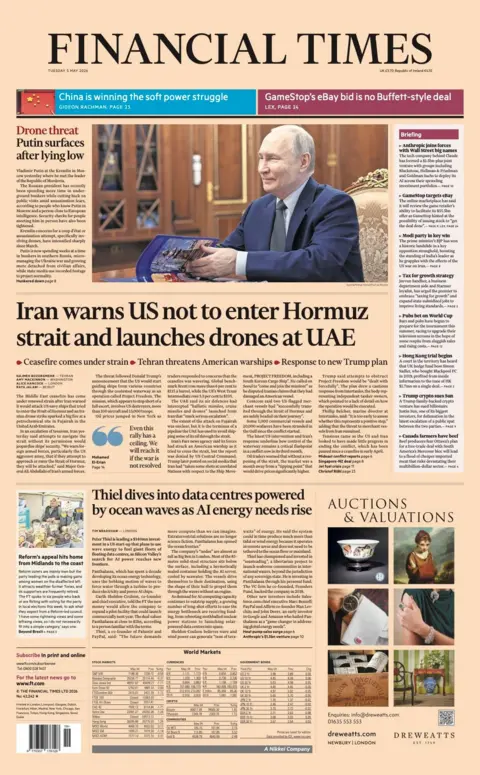 The headline on the front page of the Financial Times reads: “Iran warns US not to enter Hormuz strait and launches drones at UAE”.