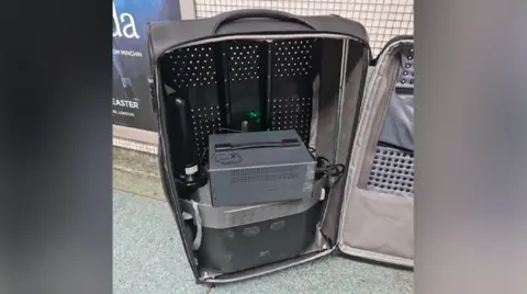 British Transport Police A 'SMS blaster' device hidden inside a suitcase 