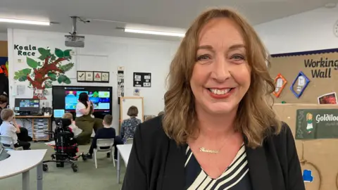 BBC The Headteacher of the Highbury Specialist School Debbie Sweet is in a class room at the new co-located school at Field Lane Primary.