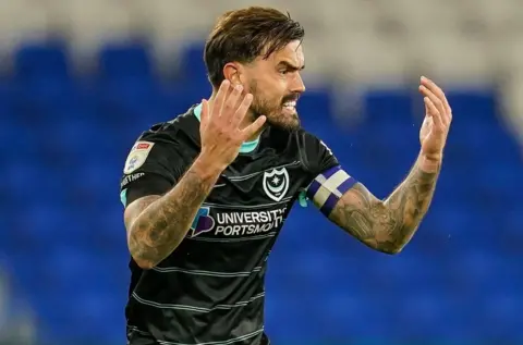 Marlon Pack remonstrates during Portsmouth's 2-0 loss away to Cardiff